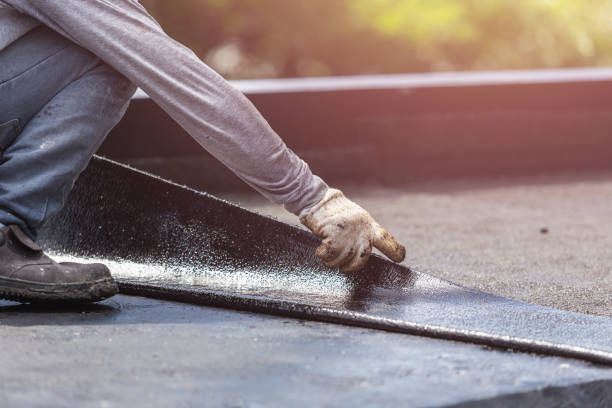 Professional Basement Waterproofing technician working in Macedon, NY